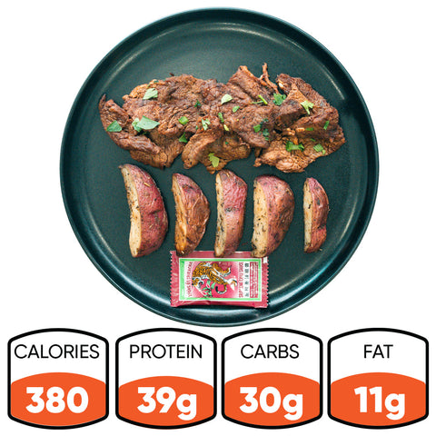 Garlic Flank Potatoes features grilled meat slices, roasted potato wedges, and a sauce packet for a high-protein meal with 380 calories, 39g protein, 30g carbs, and 11g fat.