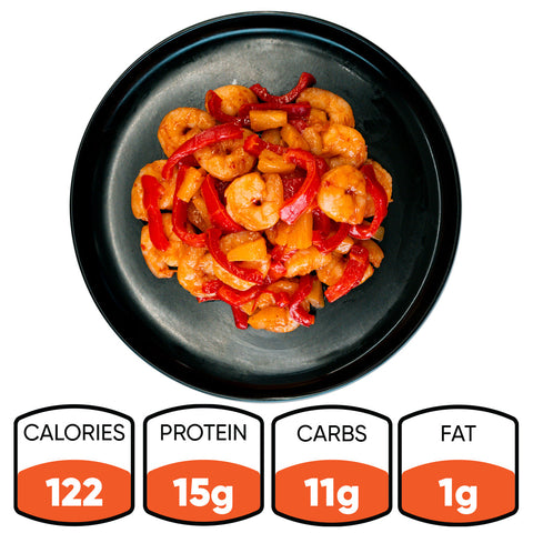 The Hawaiian Pineapple Shrimp 1lb features gluten free shrimp, red bell peppers, and pineapple on a black plate. Nutrition info: 122 calories, 15g protein, 11g carbs, and 1g fat per high-protein entrée.